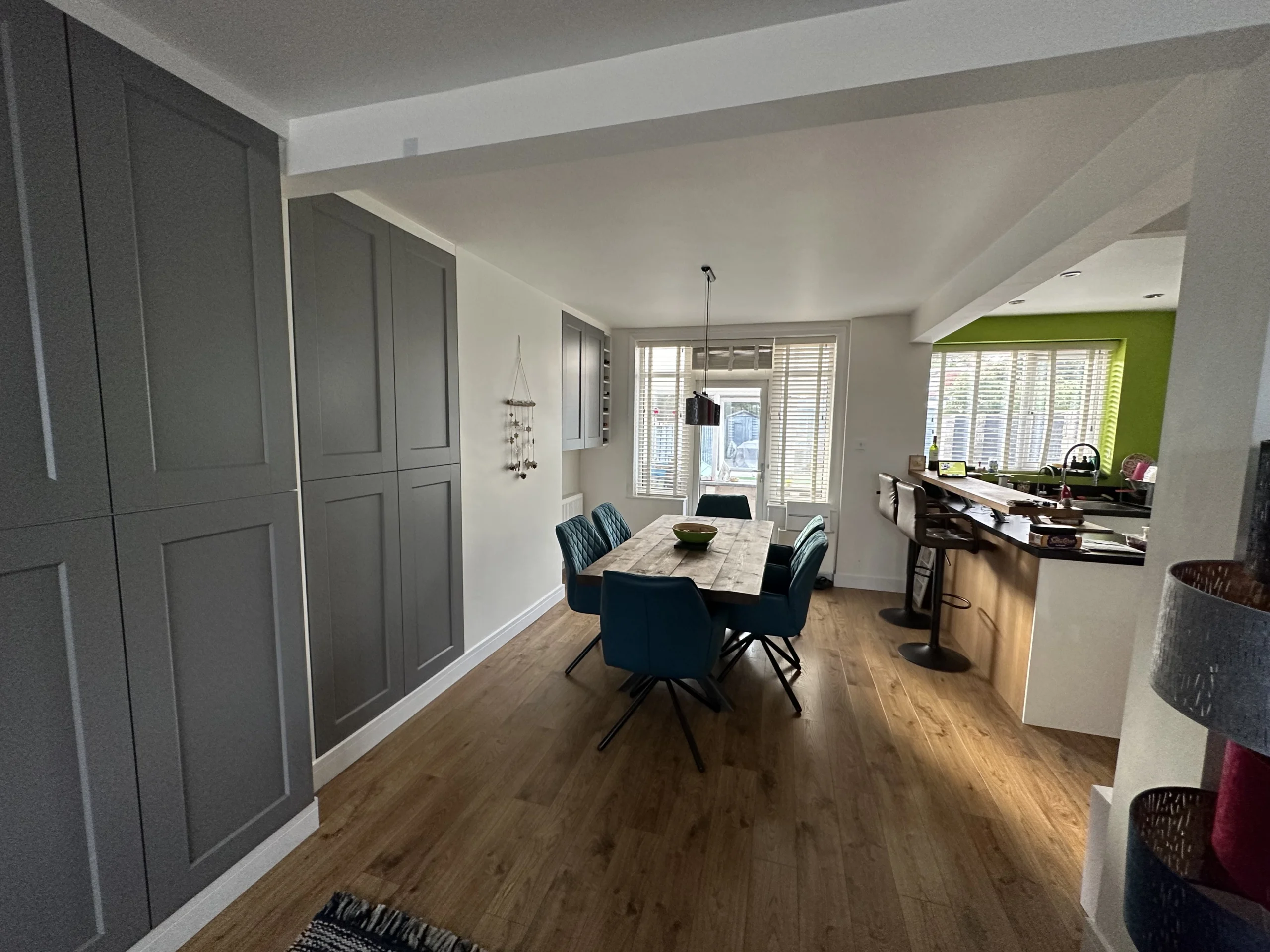 Dining area with pendant lighting